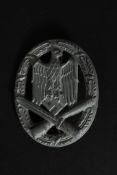 A Third Reich WWII Nazi General Assault badge, flat back.