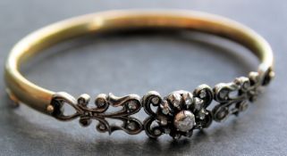 An 18ct gold and diamond bracelet. The 1