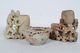 Two Oriental carved soap stone brush pot