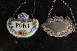 A hallmarked silver bottle label, along