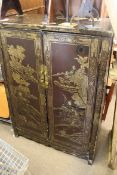 A 20th century ebonised chinoserie decor