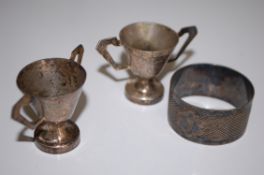 A pair of hallmarked silver cups / goblets inscribed Chilton Cantello House 1961 together with a