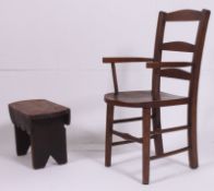 An antique rustic pine country stool along with a childs armchair on square legs with turned