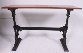 An old Yates & Greenway cast iron and mahogany rectangular pub tavern table.