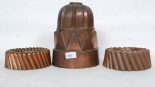 A fabulous oversized large Victorian copper jelly mould together with 2 others ( see illustration )