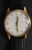 A 9ct gold gentlemans Omega wristwatch. The rear marked 375.