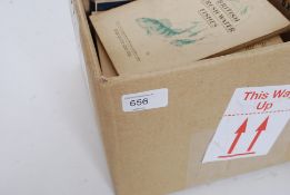 A collection of vintage cigarette cards and packets.