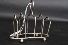 2 silver hallmarked toast racks of simple form being hallmarked for WA,