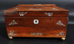 A 19th century rosewood and mother of pearl inlaid tea caddy complete with the 2 caddy inserts and