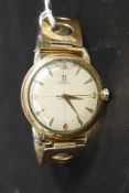 A vintage gentlemans Omega Automatic wristwatch having baton numerals,