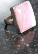 A good large ladies silver dress ring with oversized irridescent pink cabochon stone,