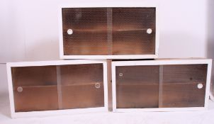 A set of 3 1950's painted kitchen hanging cabinets,