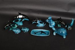 A collection of Poole Pottery china figurines to include Dolphins etc