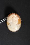 A silver ( tested ) Victorian cameo set brooch of oval form with maiden to the centre. Pin to verso.