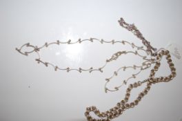 A silver ladies necklace and bracelet set together with a silver bracelet with amethyst set stones