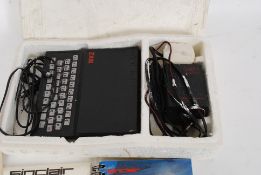 An original ZX81 spectrum home computer system complete with original adaptor and manuals with