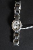 A contemporary ladies stainless steel Tissot wristwatch with sunburst face,