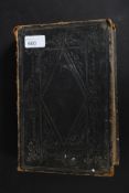 A 19th century leather bound Welsh Bible with leather embossed bindings,