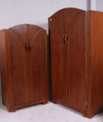 A pair of 1930's Art Deco oak wardrobes.