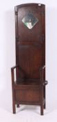 An Edwardian oak hallstand / coat rack settle having box seat to centre with hooks atop H182 W53