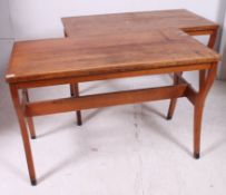 A pair of early 20th century eclesiastical pitch pine sunday school desks having unusual shaped