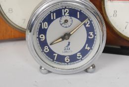 A collection of retro clocks to include a Kienzle, Smiths,