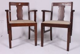 A pair of 1930's Art Deco oak cinema carver chairs.