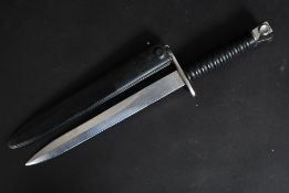 A 20th century Dutch Army bayonet dagger complete with composite scabbard.
