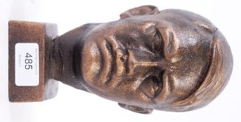 A 20th century cast metal bronze style bust of Adolph Hitler. Mounted on a square base.