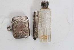 A silver hallmarked vesta being rococo chased together with a silver hallmarked pick case and a