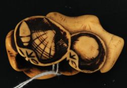 A 19th century Japanese marine Ivory netsuke of unusual form with pierced sides