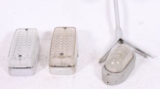 A collection of vintage Industrial bulk head lamps along with a retro Dairy lamp