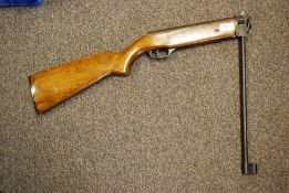 A 20th century Russian made air rifle, with wooden stock,