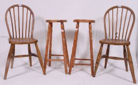 A pair of 20th century pine bar stools raised on turned supports together with 2 country Windsor