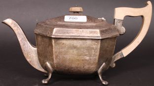 A silver hallmarked teapot marked for Edward Viner having faux ivory handle and final,