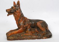 A chalk work cast Alsatian with her puppy side by side on naturalistic base signed Cuffin H41cm