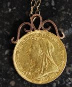 A Victorian 1896 sovereign set to a 9ct gold mount and chain.
