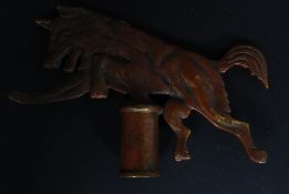 A late 19th/early 20th Century brass Friendly Society type staff finial of a wolf