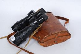 A stunning pair of military issue binoculars with leather case bearing notation  ' Binocular