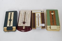 A collection of four retro telephone flip open address books