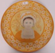 A 19th century Portuguese Malay wall charger plate bearing floral borders surrounding a central