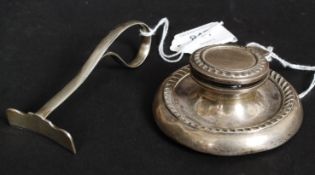 A silver hallmarked desk top inkwell complete with a glass liner.