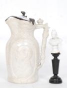 A Victorian press moulded white stoneware royal commemorative jug with portrait of the prine