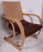 A Mies van der Rohe Design 1930's Art Deco Armchair having twin bentwood supports united by