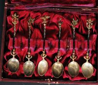 A pair of Victorian 19th century Italian silver white metal apostle spoons having simple bowls with