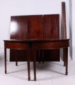 A 19th century large Georgian mahogany d-end dining table.