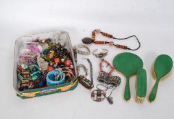 A selection of assorted costume jewellery to include bracelets, bangles,