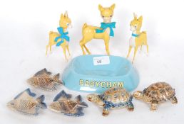 A mixed lot to include three vintage plastic Babycham fawn figures and a collection of Wade items.