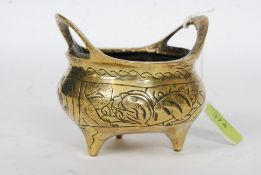 A Chinese polished bronze twin-handled censer, of small proportions,