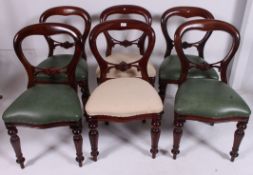 A set of 6 Victorian style mahogany balloon back dining chairs.